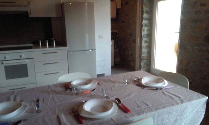 Isolalunga Apartment | Just renovated apartment with stone interior walls.