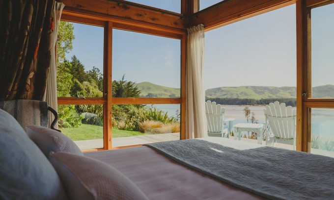 Cape Saunders Resort | Kahu Studio Wake up with a stunning view from the Papanui Inlet