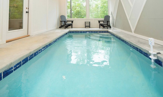 Sevierville Cabin | Kilimanjaro: Indoor Pool! Hot Tub, Wifi, Game Room, Modern, Wooded Views!