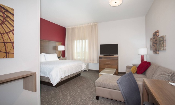 Rapid City Apartment | King Suite. Free Breakfast. Pool & Hot Tub. Great for Business Travelers!