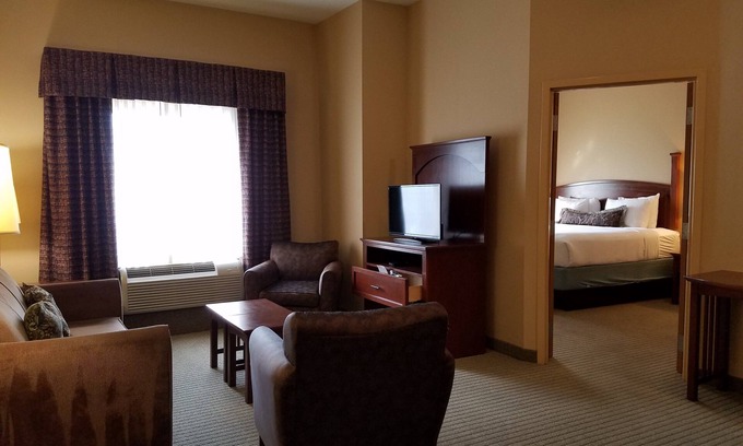 Rogers Condo | King Suite. Free Breakfast. Gym. Near Mercy Hospital Northwest Arkansas!
