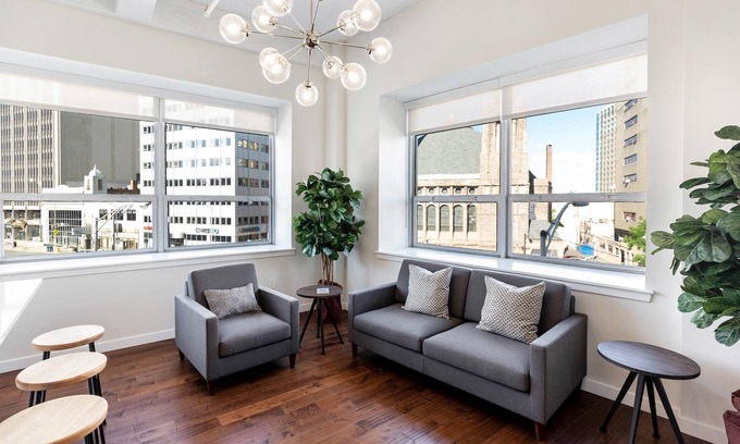 Central Business District Apartment | Kislak 407 Stunning 2BR with Den Corner Apt Retreat Above the City