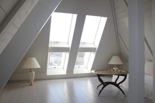 Neulindenau Apartment | Kleine Wolke - Dachgeschoss Ferienwohnung mit Klimaanlage und Ausblick