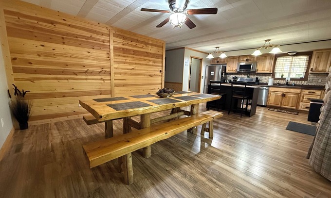 Prudenville Cabin | Knotty by Nature! Firepit and Parking! Less than a mile to trails and the lake!