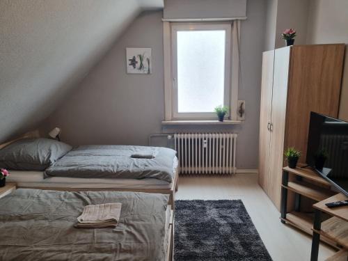 Offenbach am Main Apartment | Komfortable Unterkunft mit 3 Schlafzimmern und guter Anbindung