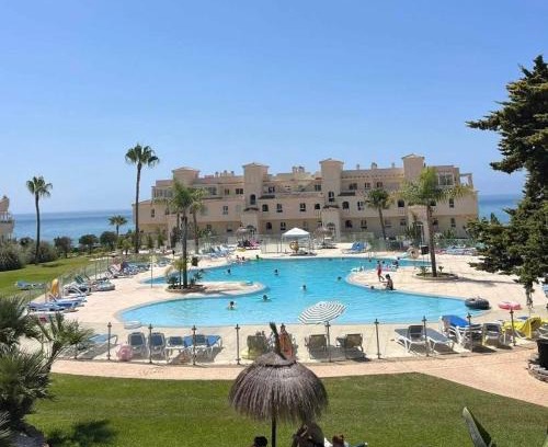 Mijas Apartment | La Cala gorgeous 2 bedroom apartment with stunning gardens, pools and sea views