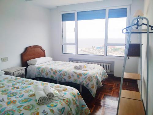 Gijon-Este Apartment | LA PERLA PRIMERA LINEA DE PLAYA SAN LORENZO