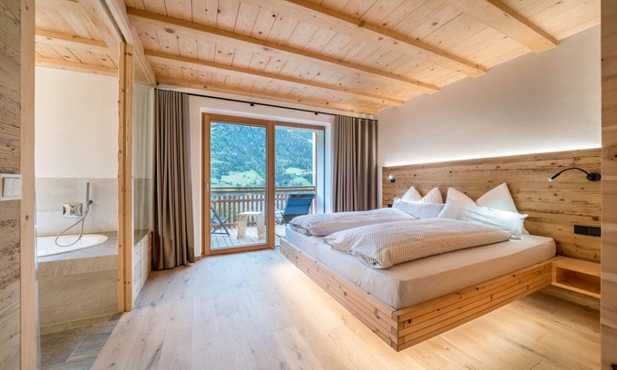 San Martino in Passiria Apartment | LAGAR holiday flat Stamer Hans' with private garden terrace and mountain view