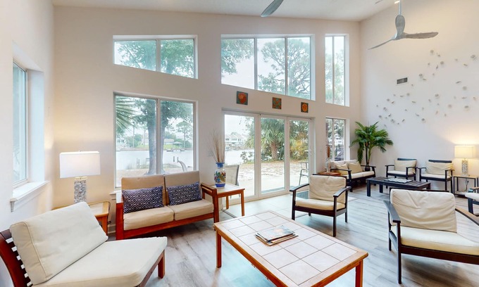 Silver Sands House | Lagoon-front home with dock & soaking bathtub