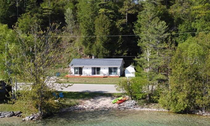 Lake Township Cottage | Lake Escape - PRIVATE LAKEFRONT WITH KAYAKS, DOCK, AND BEACH BONFIRE RING!