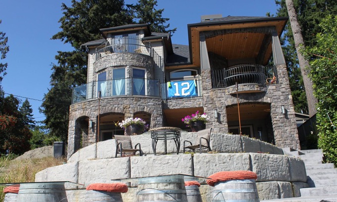 McKenna Bed & Breakfast | Lake Front Castle Style Custom Home Partial Lake View Balcony Suite