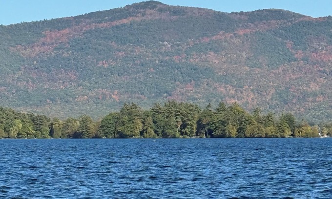 Lake George Condo | Lake side condo - ski hike beach pool dock options tennis and pickle ball