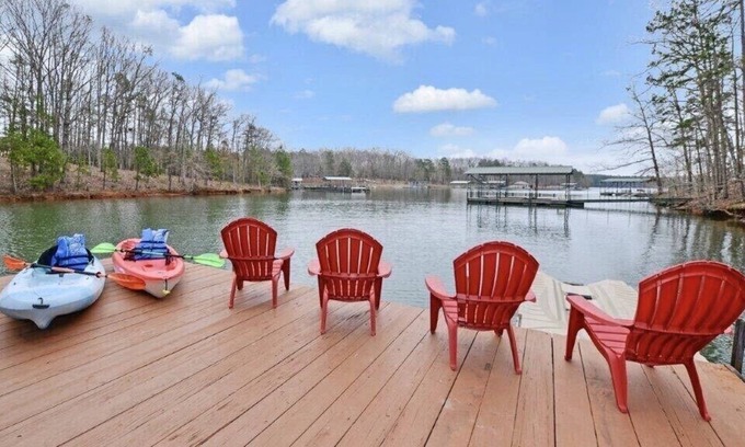 Reed Creek House | Lake toys with calm deep water dock near the widest part of the lake