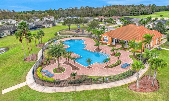 Crystal Cove House | Lake-view home with screened pool & private lanai + clubhouse pool & playground