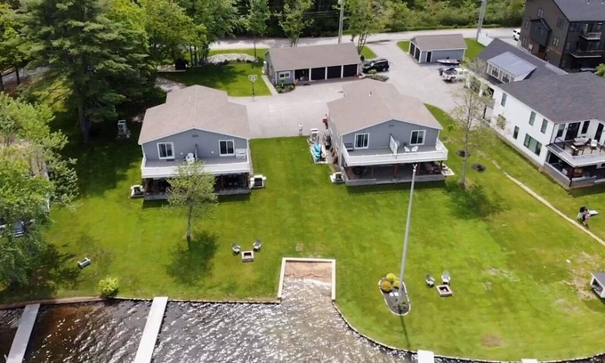 Lochmere House | Lakefront 3-bedroom Duplex on Lake Winnisquam, docks, Beach, WiFi, AC.nB2B