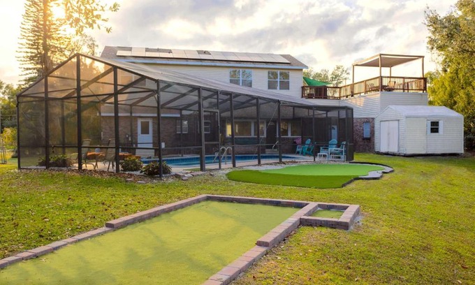 Edgewood House | Lakefront 7 Bedroom Duplex, Pool, Boat, and Hottub