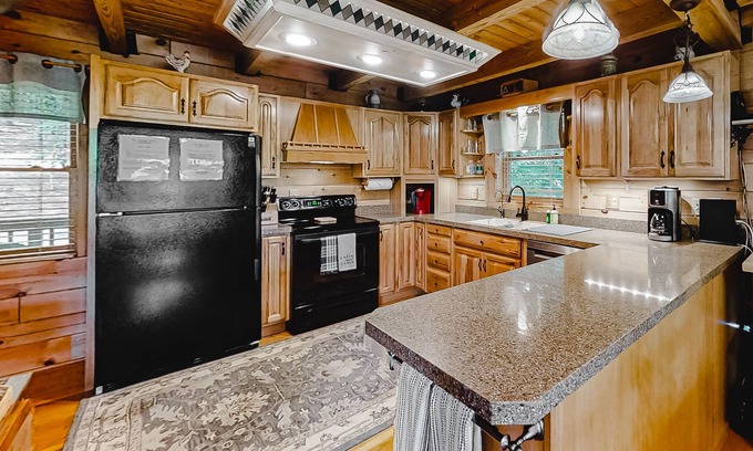 New Tazewell Cabin | Lakefront cabin with private covered dock, lovely deck, lake view & fireplace