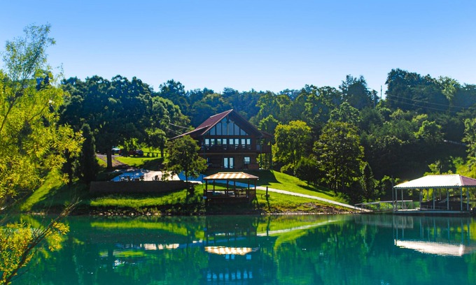 Sevierville Cabin | Lakefront cabin with views, boat ramp, dock, hot tub, & free attraction tickets