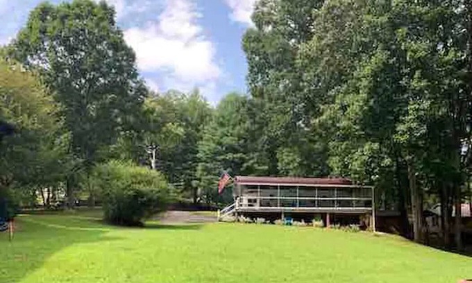 Hiawassee House | Lakefront camper, 2 bdrm/1ba. Metal roof gated deck. Covered Dock, Firepit,WIFI