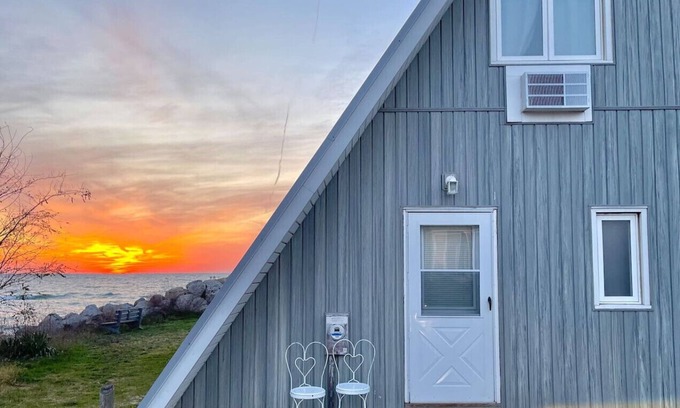 Stevensville House | Lakefront Chalet #1 with Beach Access, Pools, Sport Courts, Fishing Pond & more!