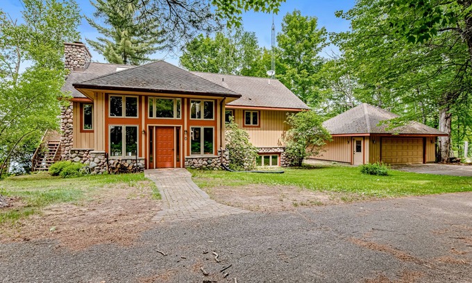 Manitowish Waters House | Lakefront, Dog-Friendly Home with Lake View, Dock, Central AC, & Wood Fireplace