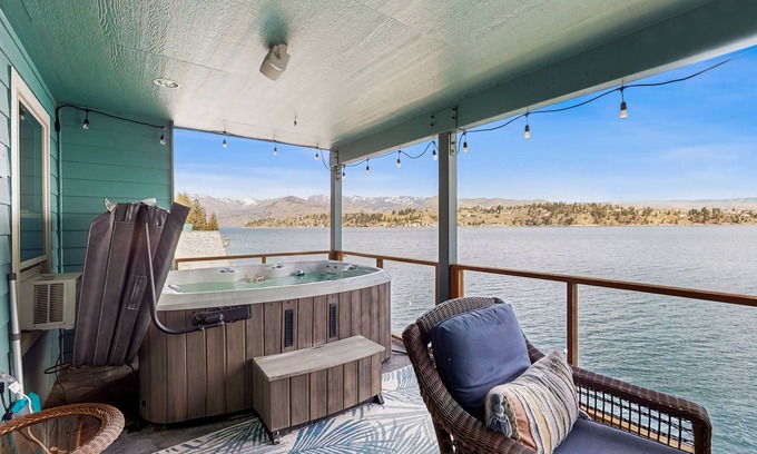 Manson House | Lakefront home with private hot tub, dock, kayaks, covered veranda & huge views