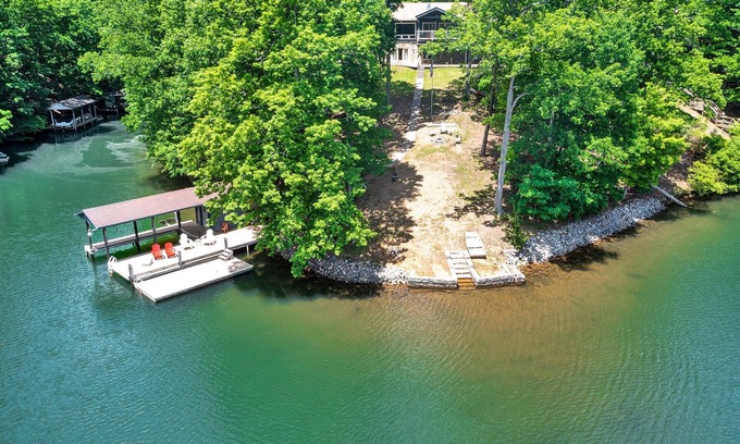 Huddleston House | Lakefront home with private hot tub, balcony, dock, & pool table