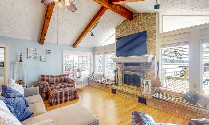 West Livingston House | Lakefront Home with Private Dock, Outdoor Kitchen - Dog-Friendly