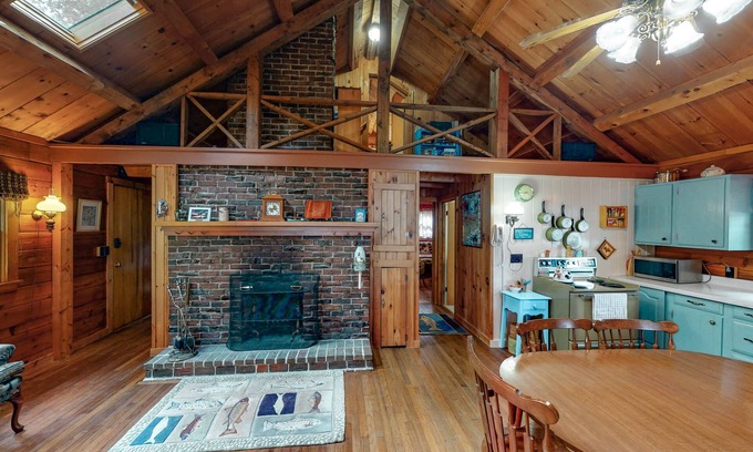 Mariaville Cabin | Lakefront home with stunning views, firepit, 2 canoes, fast WiFi & yard games