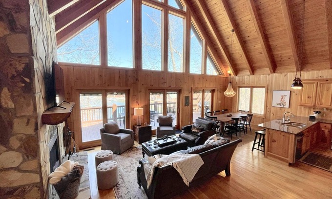 Six Mile House | Lakefront house with multiple outdoor areas, fire pit, dock and two kayaks