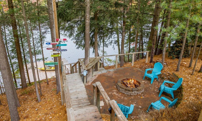 South Boardman House | Lakefront retreat 30 min to Traverse City. Hot tub, fire pit, kayaks, game room.