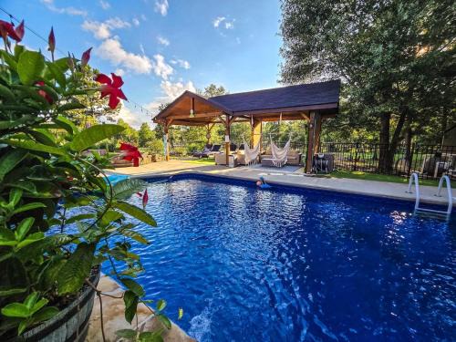Upatoi House | Lakefront Retreat with Pool, Game Room & Private Pier