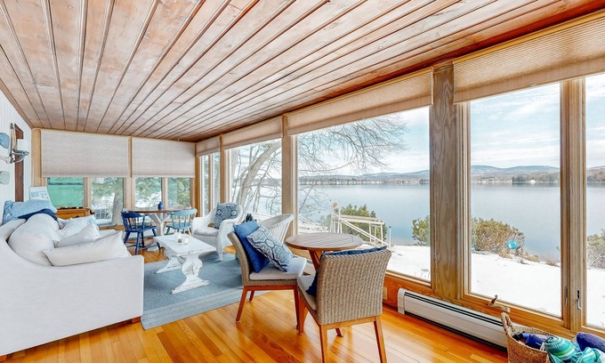 Laconia House | Lakefront spacious all season home w/dock, deck, outdoor kitchen, sunrise views
