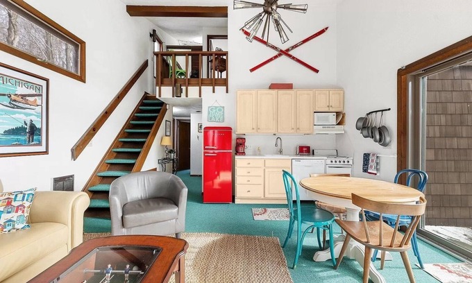 Gaylord Ski Chalet | Lakefront Vintage Chalet Surrounded by Lush Forest + Boats, Kayaks, Retro Games