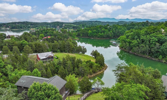 Sevierville Cabin | Lakefront with Dock! Hot Tub! Firepit! Pool Table! Mountain View! Pets!
