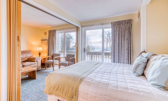 Gilford Condo | Lakeview condo with tennis, sauna, shared pool & a private beach