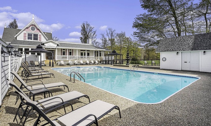 Fennville House | Large family friendly compound, heated pool, and Indoor Basketball court