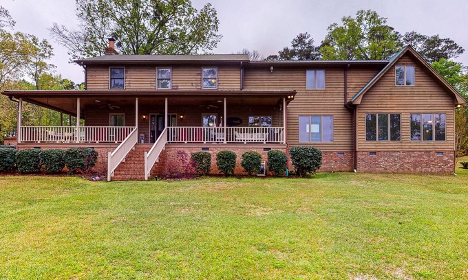 Leesville House | Large lakefront home with porch, private dock, fire pit, WiFi, & AC