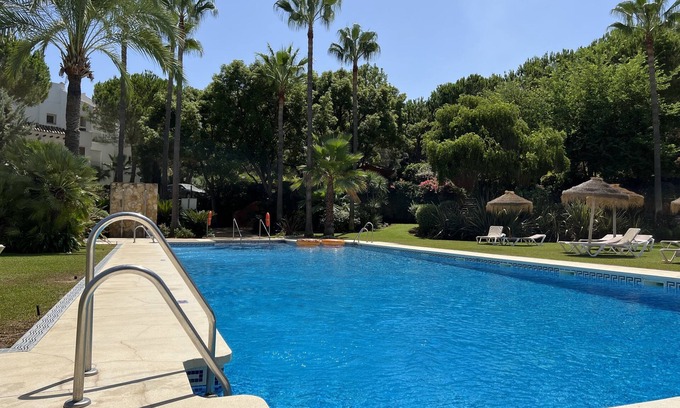 Benahavis Apartment | Large Luxury Apartment La Quinta Golf in tranquil garden & large pool FREE WIFI