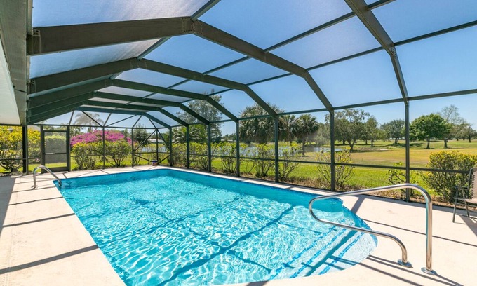 Port Saint Lucie House | Large Tropical Pool Lakefront Golf course 4-bedroom Home Close to Jensen Beach!