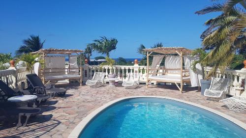 Le Moule House | LE MOULIN DE LA BAIE piscine vue mer
