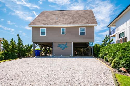 Caswell Beach House | Linger Longer by Oak Island Accommodations