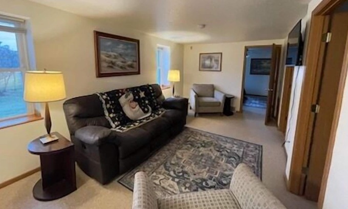 Two Rivers Apartment | Live. Work. Play. Scenic Waterfront Apt in Two Rivers!