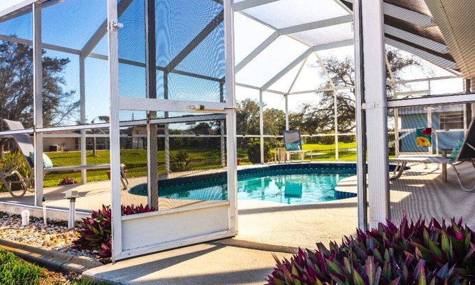 Long Meadow House | Living the tropical dream in this beautiful 3-bedroom canal oasis in SW Florida.