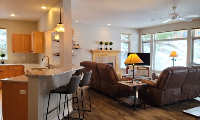 Bellaire Condo | LOCATION LOCATION! Golfers Paradise & ski in/out on the 18th green Cedar River