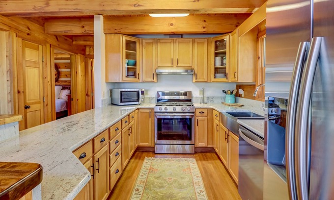 Cherokee Cabin | Log cabin in private community with stone fireplace & wrap-around porch