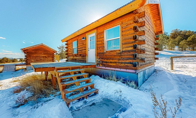 Colorado Springs Cabin | Log cabin on 1,800-acre ranch with sweeping mountain & meadow views