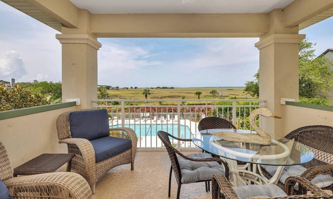 St. Simons Island Condo | Long distance marsh views and community pool.