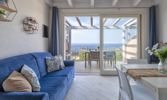 Paduledda Apartment | Lovely apartment for 4 people with A/C, pool, TV, terrace, pets allowed and parking