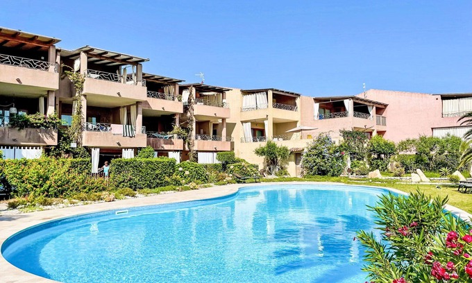 Porto Pozzo Apartment | Lovely apartment for 4 people with WIFI, pool, A/C, terrace, pets allowed and parking